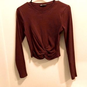 Ribbed tie front long sleeve top.